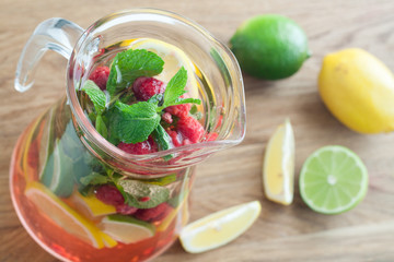 detox water with raspberries, lime, mint for weightloss top view