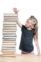 Schoolgirl showing her hand the size of a stack of books to explore, isolated on a white background