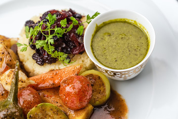 Steamed vegetables with mashed potatoes and sauce