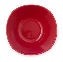 Empty stylish porcelain bowl, dark red tone, isolated on white background, top view.