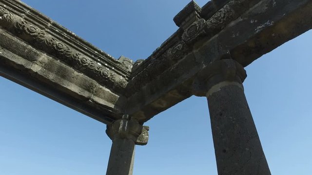 Slowly Rotating Around Top of Ornate Ancient Temple