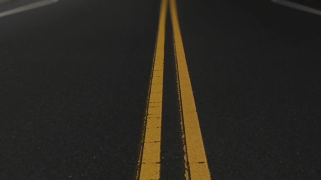 Overhead of a Street Road with Solid Double Yellow Lines Loop