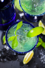 Fototapeta na wymiar Blue Margarita Cocktail. Selective focus.