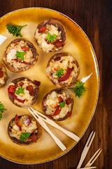 Stuffed Mushrooms with Bacon, Cheese and Breadcrumbs. Selective focus.