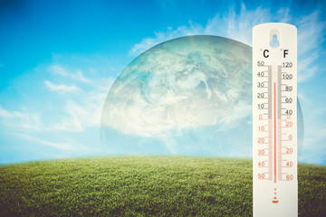 Thermometer check the earth's temperature with impact of global environment concept, Elements of...