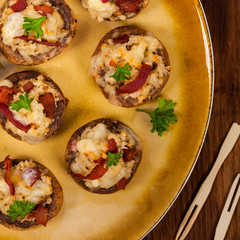 Stuffed Mushrooms with Bacon, Cheese and Breadcrumbs. Selective focus.