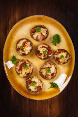 Stuffed Mushrooms with Bacon, Cheese and Breadcrumbs. Selective focus.