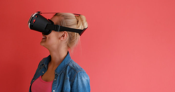 young girl using VR headset glasses of virtual reality