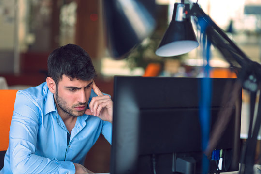 Freelance programmer working in startup office