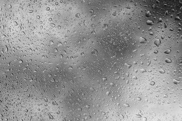 Water backgrounds with water drops. Gray water bubbles. Water drops on glass.