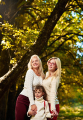 Fototapeta premium Happy sisters in park