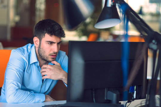 Freelance programmer working in startup office