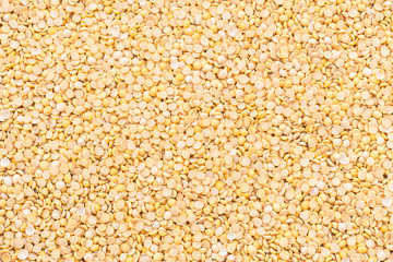 Macro peeled yellow soybean for food texture and background