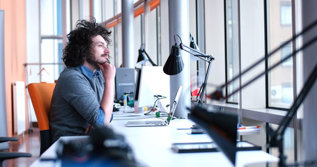 businessman working using a laptop in startup office