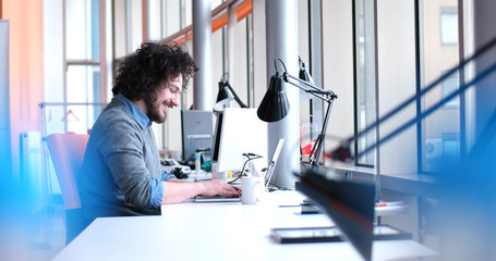 businessman working using a laptop in startup office