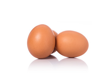 Fresh chicken egg shot in studio. Isolated on white