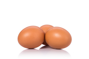 Fresh chicken egg shot in studio. Isolated on white