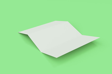 Blank white three fold brochure mockup on green background