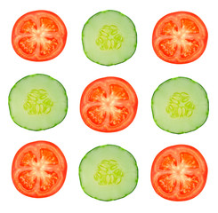 pieces of tomatoes and cucumber on a white background, slice cucumber ans tomato on white