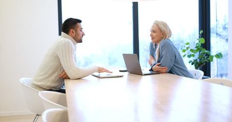 Startup Business Team At A Meeting at modern office building