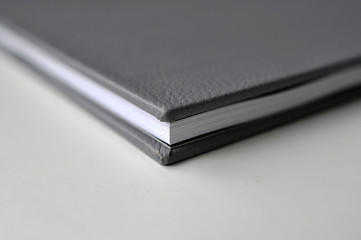 A black leather cover book