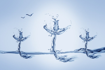 Three crosses made of water with flying birds.