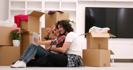 young couple moving  in new house