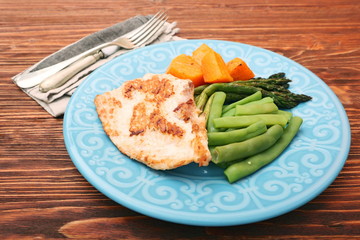 Roast turkey fillet with asparagus pumpkin and green beans
