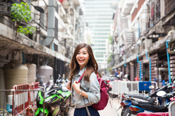 Young asian lady travel in city center