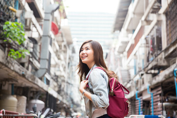 Young asian lady travel in city center