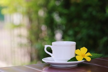 White coffee cup closeup on table relax at home outdoor background