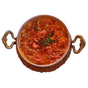 Menemen Turkish breakfast food egg, tomatoes and pepper in pan