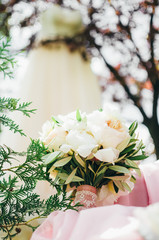 Wedding bouquet on a wedding dress background