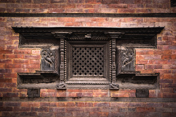 Nepali traditional wooden window and brick wall , visit Nepal, Nepal travel, traditional crafting