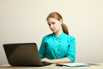 nurse working on laptop