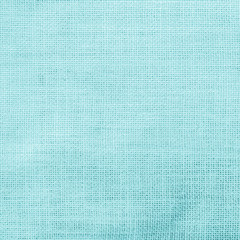 Fototapeta premium Hessian sack cloth texture canvas fabric pattern background in light pastel cyan blue color