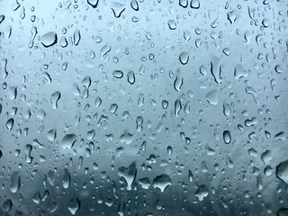 The Raindrops beside glass windows