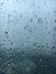 The Raindrops beside glass windows
