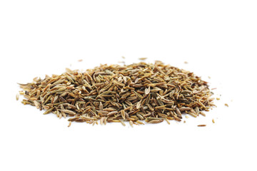 Pile of caraway seeds isolated on a white