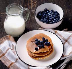 Pancakes with fresh blueberry and honey