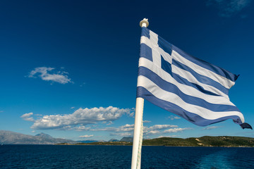 Flag of Greece with the sea