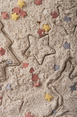 Abstract Christmas food background with cookies molds and flour