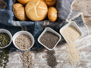 fresh rolls and freshly baked bread with variety of healthy seeds