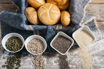 fresh rolls and freshly baked bread with variety of healthy seeds