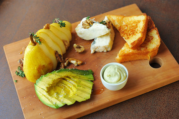 Healthy brekfast, Toast with cream cheese, pear and avocado