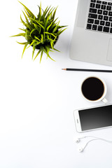 Office desktop with modern laptop and accessories. Business background