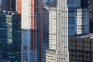 New York City Manhattan skyscrapers aerial view under construction in the evening sunlight