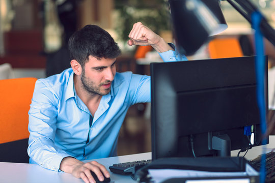 Freelance programmer working in startup office