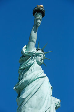 Statue of Liberty low angle view, blue sky in New York