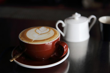cappuccino coffee on dark background